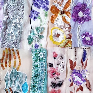 May include: A patchwork of fabric squares decorated with colorful sequins and beads. Each square features a different design, including flowers, geometric patterns, and abstract shapes. The fabric is a mix of textures, including smooth satin, textured velvet, and delicate lace.