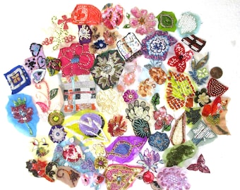 May include: Assortment of colorful beaded and sequined fabric embellishments, perfect for adding a touch of sparkle to clothing, accessories, or home decor projects.