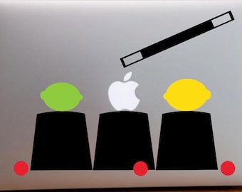 The cups and balls Magic Macbook vinyl decal.