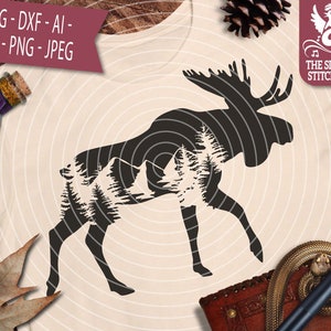 May include: A black silhouette of a moose with a mountain range and pine trees inside its body. The image is on a beige background.