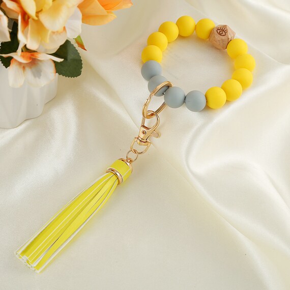 Prodotti - Portachiavi in Silicone, con Bracciale e in Tessuto