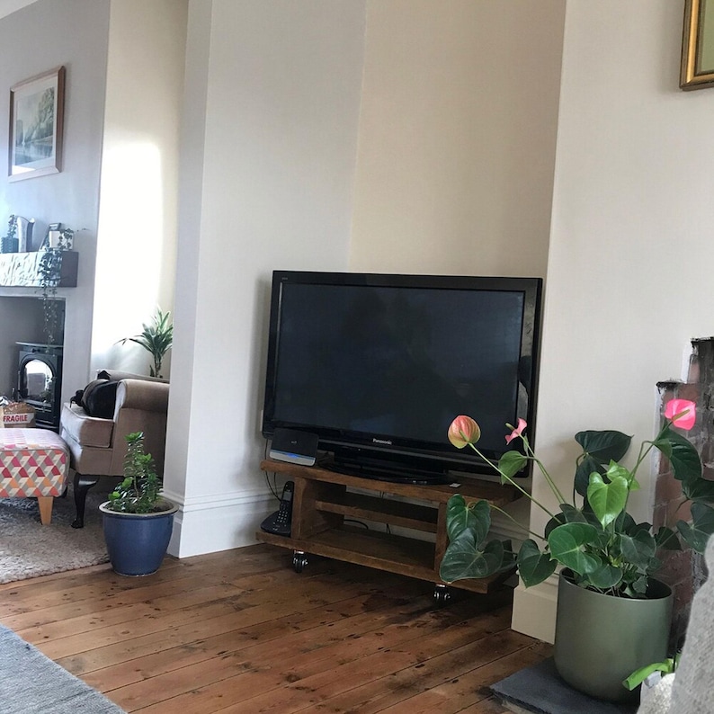 Customer image of the small size Wooden Tv Cabinet with Castor Wheels