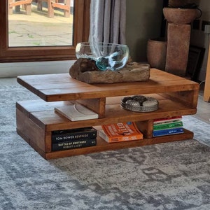 customer image of the large size Rustic Coffee Table in  an antique oak wood stain.