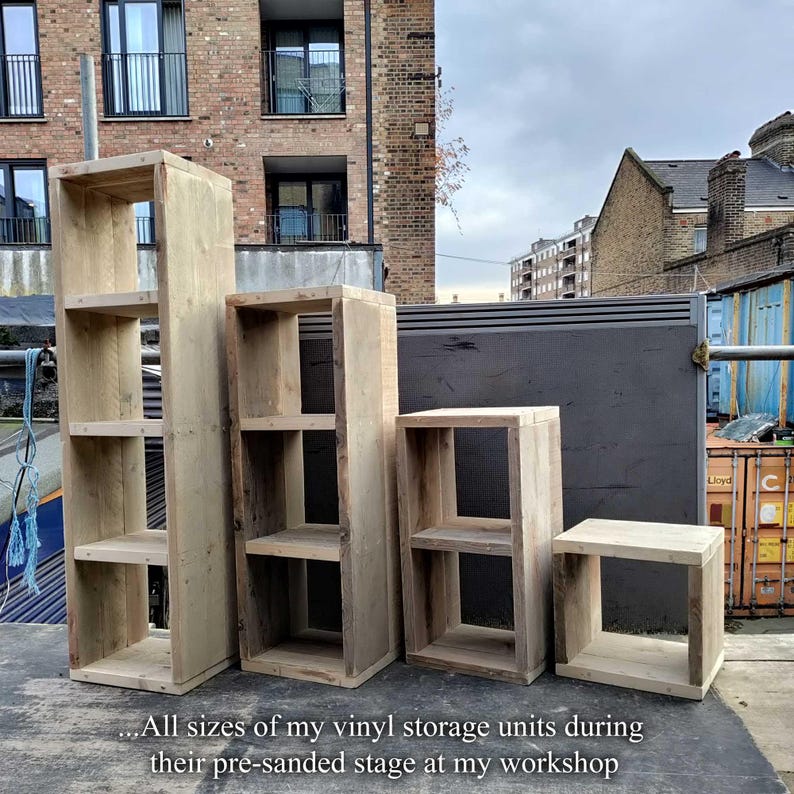 image showing the 4 different sized storage units available. Image taken before the sanding and staining process.