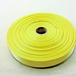 Fantastische gele linthaspel > 23 mm breed, 100 meter