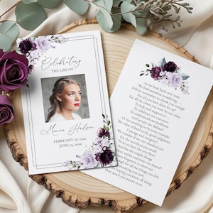 May include: Two rectangular funeral program cards featuring a portrait of a person, floral illustrations in shades of deep purple and lavender, and black text. The front card reads Celebrating the Life of Monica Hudson, February 16, 19xx, June 19, 20xx.