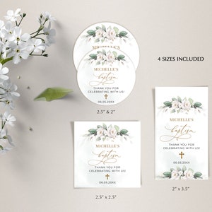May include: Four sizes of white and green floral baptism favor tags with gold calligraphy text. The text reads "Michelle's Baptism" and "Thank you for celebrating with us!" with a cross and date. The tags are available in 2.5 inches by 2.5 inches, 2.5 inches by 2 inches, 2 inches by 3.5 inches, and 2 inches by 2 inches.