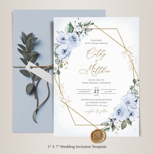 May include: A wedding invitation template with a gold geometric frame and blue watercolor flowers. The text reads "Together with their families Cathy & Matthew Invite you to their wedding ceremony Saturday Aug 27 XX:XX PM Woodland Grand Mansion 396 Thomas Avenue Pensacola, FL 33144 Reception to follow".
