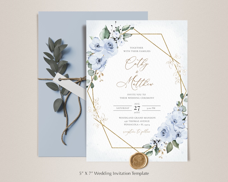 May include: A wedding invitation template with a gold geometric frame and blue watercolor flowers. The text reads "Together with their families Cathy & Matthew Invite you to their wedding ceremony Saturday Aug 27 XX:XX PM Woodland Grand Mansion 396 Thomas Avenue Pensacola, FL 33144 Reception to follow".