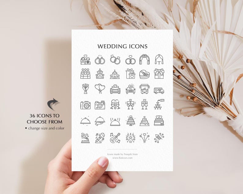 May include: A white card displays 36 black wedding icons, including rings, churches, and cakes. Text reads "WEDDING ICONS" at the top and "36 ICONS TO CHOOSE FROM" with instructions to change size and color. The card is held by a hand.