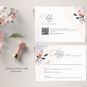 May include: Two designs of RSVP cards with a watercolor floral motif. The cards are white with a light blue and pink watercolor background. The text on the cards reads "Reply by the 5th of June".