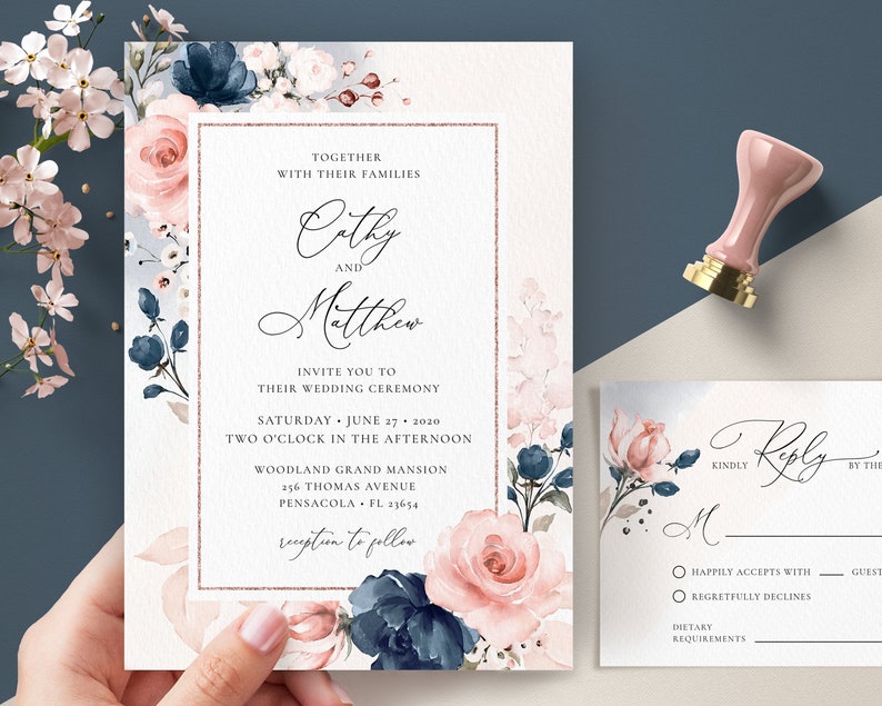 May include: Wedding invitation with a floral design in shades of blue and pink. The invitation features the names "Cathy and Matthew" and details for their wedding ceremony on June 27, 2020, at Woodland Grand Mansion in Pensacola, Florida.