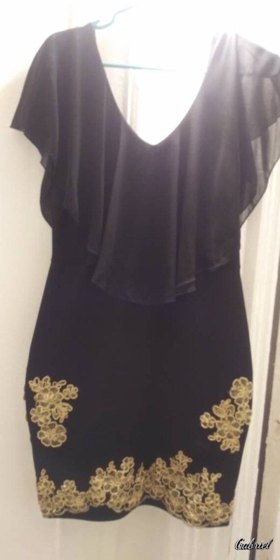 black dress with gold trim