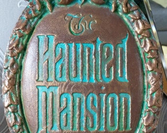 Haunted mansion plaque