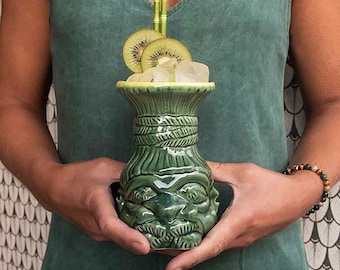 Green Shrunken Head Tiki Mug: Ceramic Polynesian Cocktail Cup
