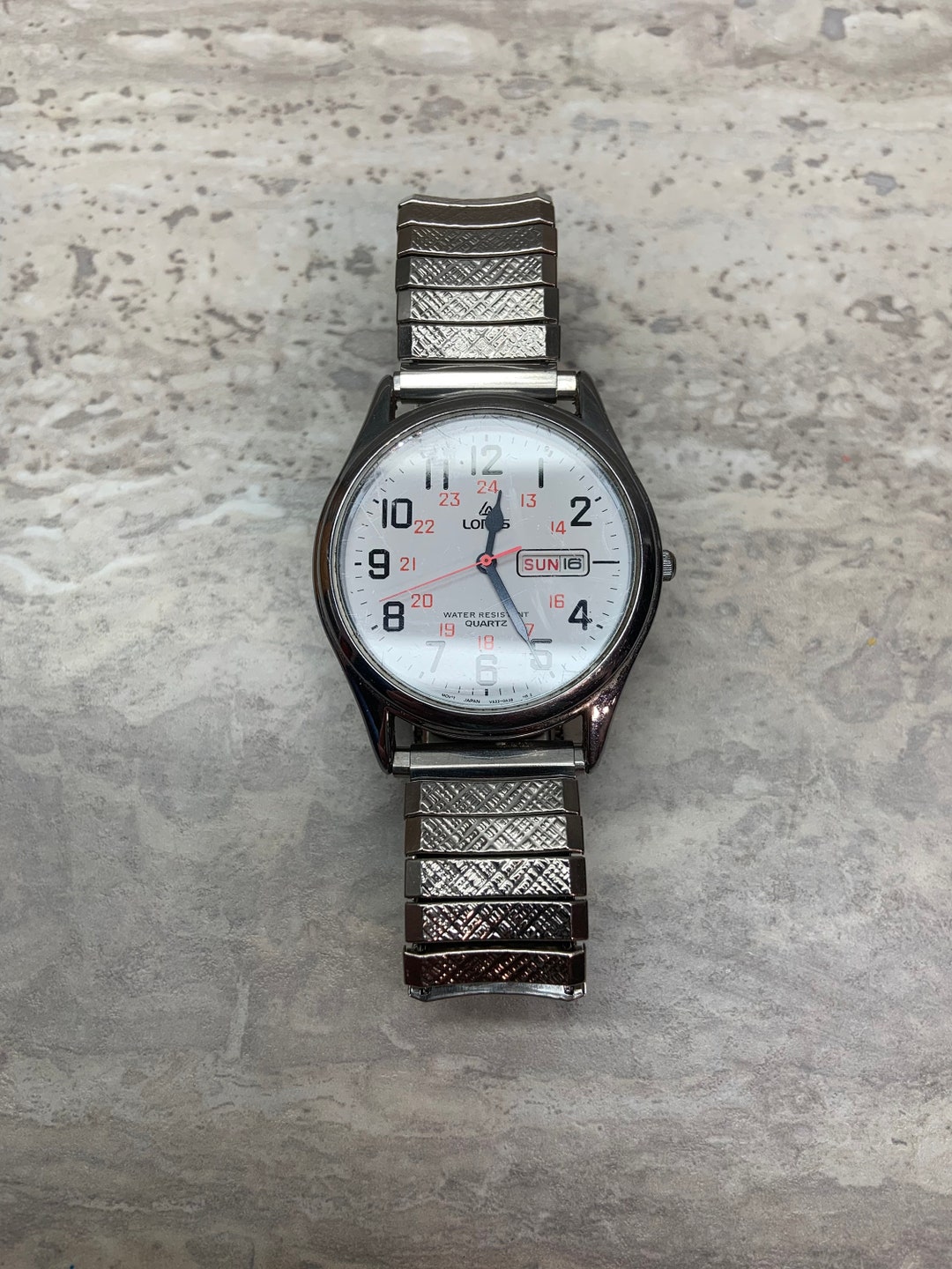 Montre Lorus Quartz Ancienne – Étanche – Pour Homme – Occasion