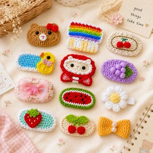May include: A collection of twelve assorted crochet hair clips featuring various designs including a brown bear, a rainbow, cherries, a yellow duck, a red-hooded character, purple grapes, a pink bow, a watermelon slice, a white daisy, a strawberry, and a yellow bow.
