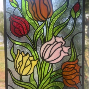 Stained glass panel with tulips