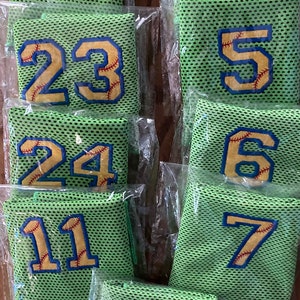 Lime green Softball cooling towels outlined in navy .  Softball cooling towels have the yellow to represent the softball.  If you don't select an outline stitch color, I will choose something that looks good with the towel color you selected.