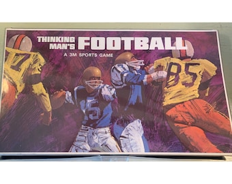 May include: A vintage board game box with the title "Thinking Man's Football" and a 3M Sports Game logo. The box features a colorful illustration of three football players in action.