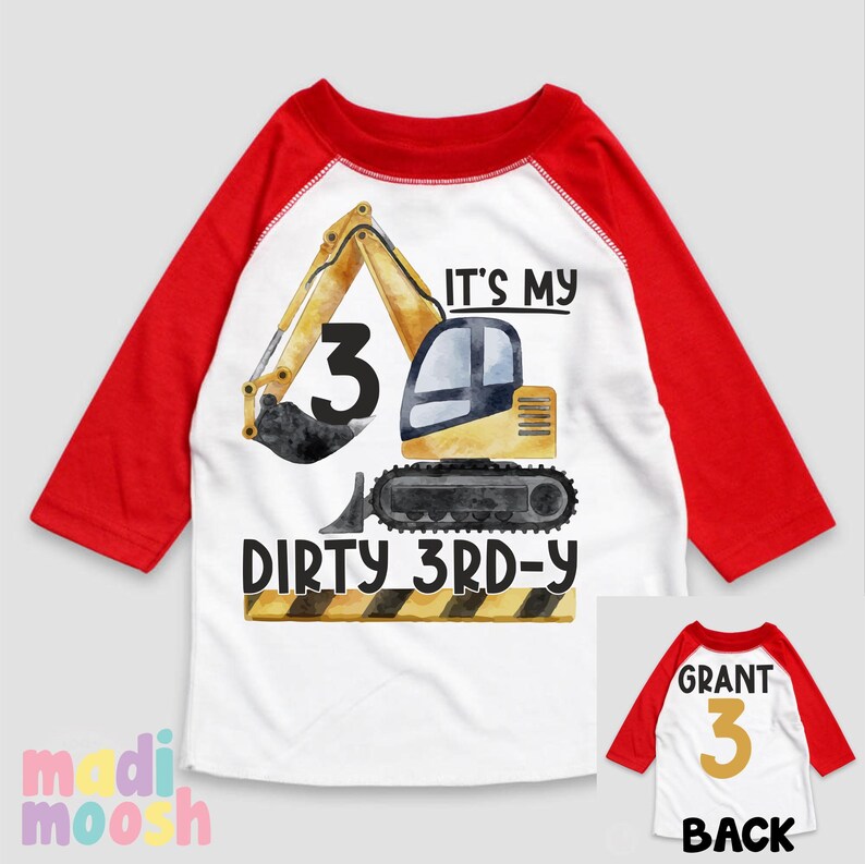 May include: A white and red baseball style t-shirt with a yellow excavator and the text "It's my dirty 3rd-y". The back of the shirt has the text "Grant 3".