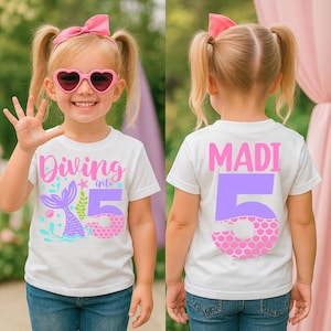 May include: White t-shirt with a mermaid-themed design. The front features the text "Diving into 5" with a mermaid tail graphic. The back of the shirt displays the name "MADI" and the number "5".