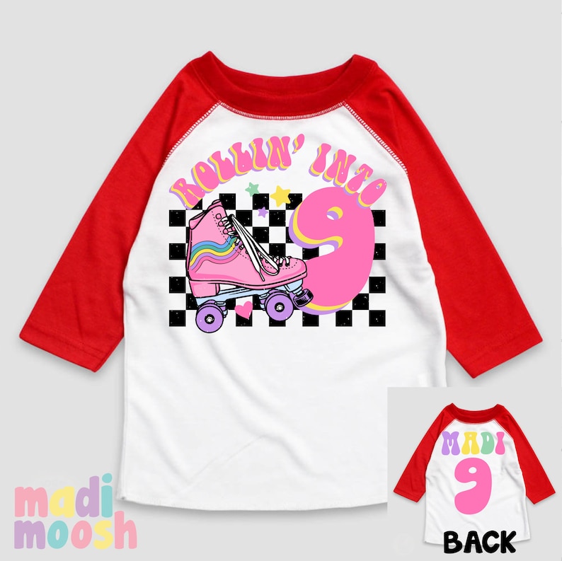 May include: White and red baseball tee shirt with a pink roller skate and the text "Rollin' into 9" on the front. The back of the shirt has a pink number 9.