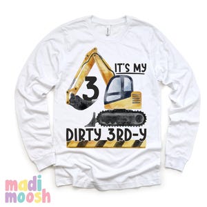 May include: White long-sleeve t-shirt with a yellow excavator graphic and the text "It's my 3rd-y Dirty 3rd-y".