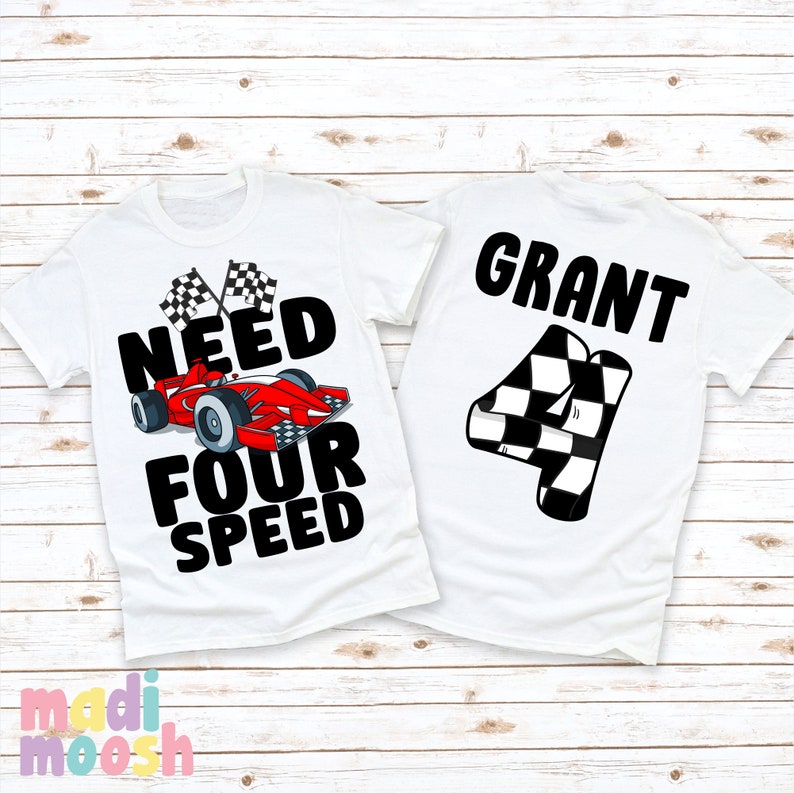 May include: Two white t-shirts with a racing car theme. One shirt has a red race car with the text "Need Four Speed" and checkered flags. The other shirt has the name "Grant" and a checkered flag number "4".