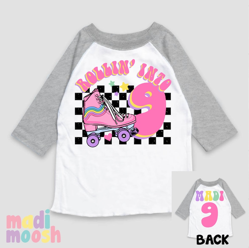 May include: White and grey baseball tee shirt with a pink roller skate and the text "Rollin' into 9" in a retro font. The back of the shirt has the text "Madi 9" in a pink and yellow font.