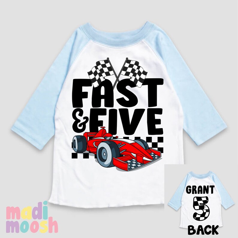 May include: A white and blue baseball style shirt with a red race car and chequered flags. The text "Fast & Five" is printed on the shirt. The back of the shirt has a blue and white chequered number 5 with the name "Grant" printed above it.