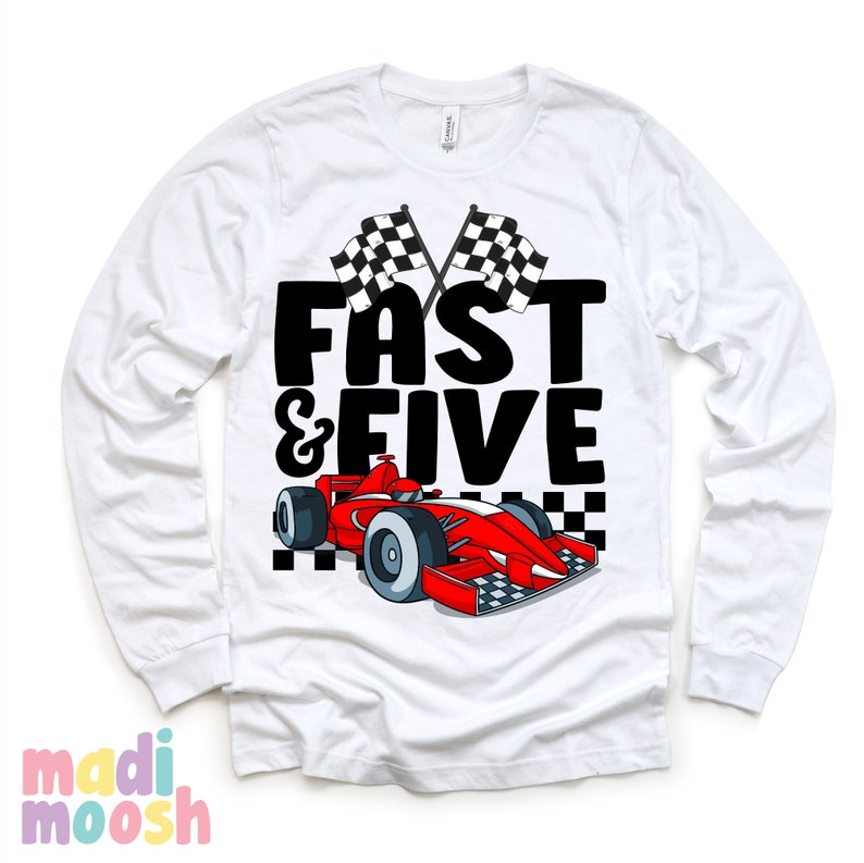 May include: White long-sleeved t-shirt featuring a red racing car, black chequered flags, and the text "Fast & Five" in black.