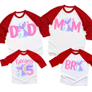 May include: Set of four red and white baseball shirts with a mermaid theme. The shirts say "Dad", "Mom", "Diving into 5", and "Bro".