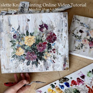 May include: A close-up of a painting of a bouquet of flowers in shades of yellow, pink, and purple. The painting is done with a palette knife and has a textured, rustic look. The title of the painting is "Rustic Bouquet" by Meadow Hue Art Studio.