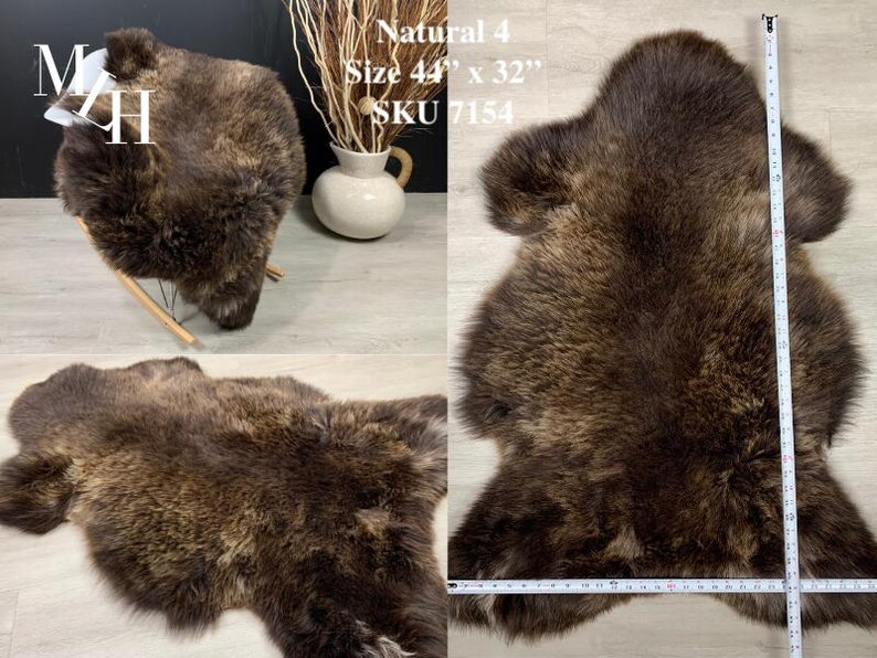 May include: A brown sheepskin rug with long, soft fur. The rug is 44 inches by 32 inches and is labeled "Natural 4, SKU 7154".