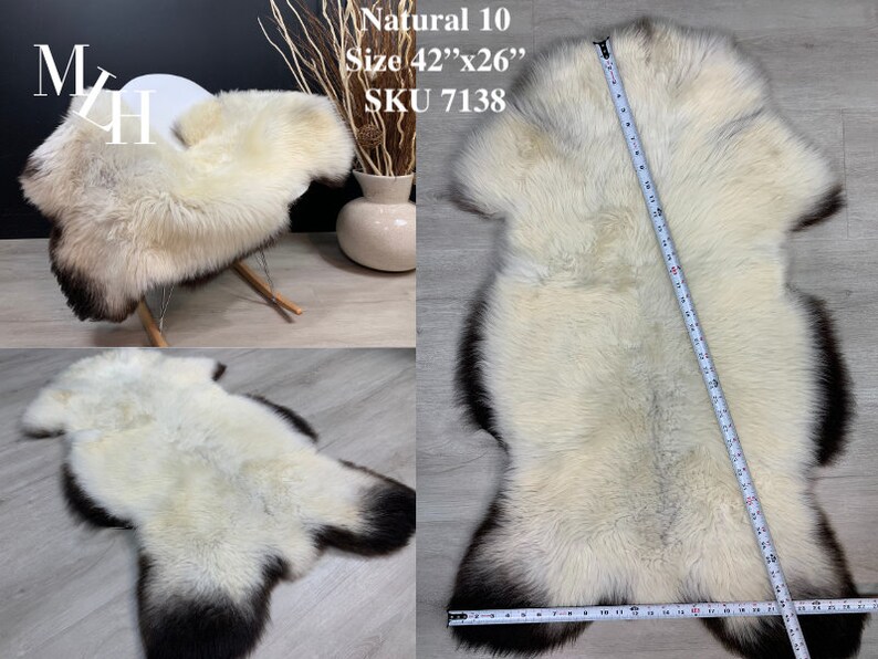 May include: Natural white sheepskin rug with a black border. The rug is 42 inches by 26 inches and has the SKU 7138.