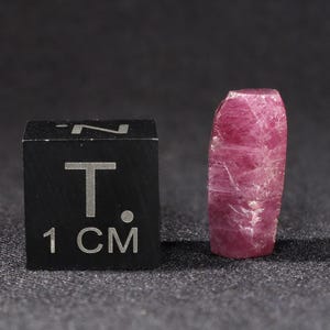 May include: A set of three ceramic mugs with a speckled, matte finish. The mugs are in shades of cream, light gray, and dark gray. Each mug has a simple, minimalist design, perfect for coffee or tea.