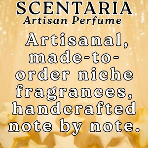 May include: A golden-toned image with the text "SCENTARIA Artisan Perfume." The text below reads "Artisanal, made-to-order niche fragrances, handcrafted note by note." The background has a soft, blurred effect.