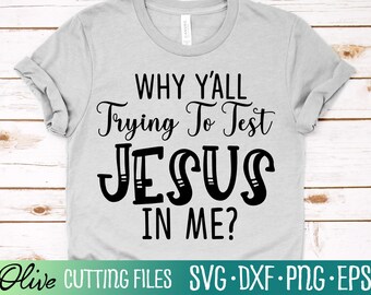 May include: A gray t-shirt with black text that reads "WHY Y'ALL Trying To Test JESUS IN ME?"  The text is in a stylized font.