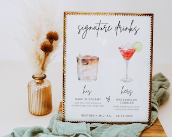 May include: A gold framed sign with the words "signature drinks" at the top. The sign lists two cocktails, one labeled "his" and the other labeled "hers". The "his" cocktail is called "Dark 'N Stormy" and the "hers" cocktail is called "Watermelon Cobbler". The sign also includes the names "Heather + Michael" and the date "04.12.20XX".