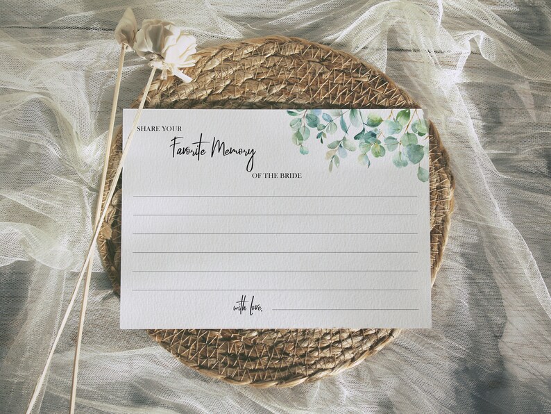 May include: White card with green watercolor eucalyptus leaves and the text "Share your Favorite Memory of the Bride. With love."