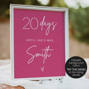 May include: A pink sign with white text that reads "20 days until she's Mrs. Smith". The sign is in a white frame and has a small heart at the bottom. The text "Editable background colors" and "Try the demo in the listing details" is also visible in the image.
