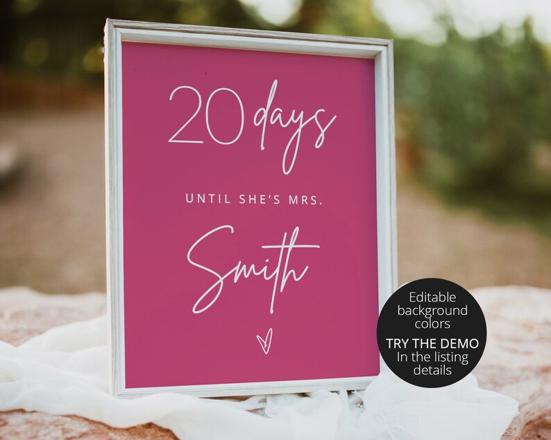 May include: A pink sign with white text that reads "20 days until she's Mrs. Smith". The sign is in a white frame and has a small heart at the bottom. The text "Editable background colors" and "Try the demo in the listing details" is also visible in the image.