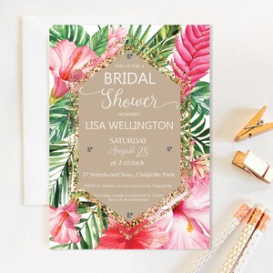 May include: Tropical themed bridal shower invitation with pink hibiscus flowers, green palm leaves, and gold glitter accents. The invitation reads "Join us for a Bridal Shower Honoring Lisa Wellington Saturday August 28 at 2 o'clock 57 Windward Way, Claigville Park RSVP to Valerie on xxx xxx xxx by August 1st"