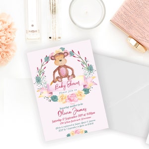 May include: Pink baby shower invitation with a watercolor illustration of a monkey wearing a flower crown. The invitation reads "Baby Shower" and includes the date, time, and location of the event. RSVP information is also included.