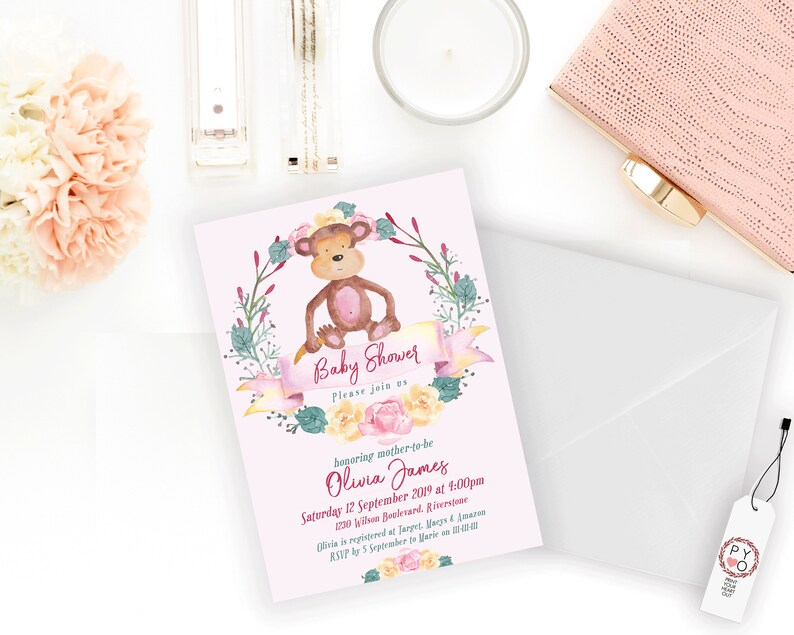 May include: Pink baby shower invitation with a watercolor illustration of a monkey wearing a flower crown. The invitation reads "Baby Shower" and includes the date, time, and location of the event. RSVP information is also included.
