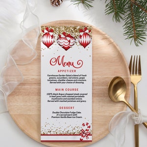 May include: A rectangular white menu card featuring red and white Christmas ornaments at the top, gold glitter accents, and a candy cane at the bottom. The text reads Menu, Appetizer, Main Course, and Dessert with detailed food descriptions.