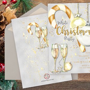 May include: A festive Christmas party invitation with a watercolour design. The invitation features champagne glasses, candy canes, and baubles. The text reads "White Christmas Party" with the date and time. The invitation is on a grey background with gold accents.