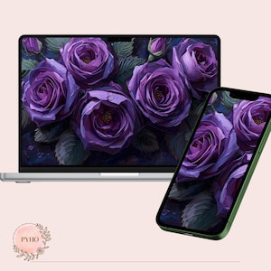 May include: A laptop and smartphone display a digital image of purple roses. The roses are in full bloom, with dark green leaves and a dark background. The smartphone has a green case. The image is a floral design.
