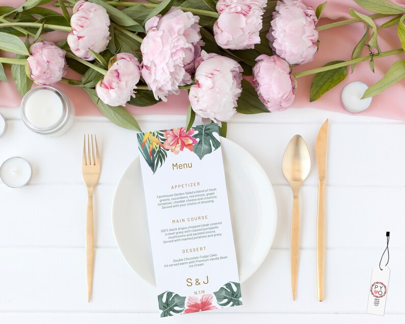 May include: A wedding menu with a tropical theme. The menu is printed on white cardstock with a floral design and the text "Menu", "Appetizer", "Farmhouse Garden Salad", "Main Course", "100% Angus Chopped Steak", "Dessert", "Double Chocolate Fudge Cake", "S&J", "18.7.19".